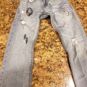 Boys Levi size 6 distressed with patches jeans